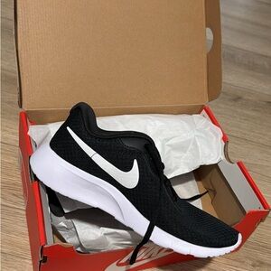 Nike Black Athletic Sneaker with White Swoosh
